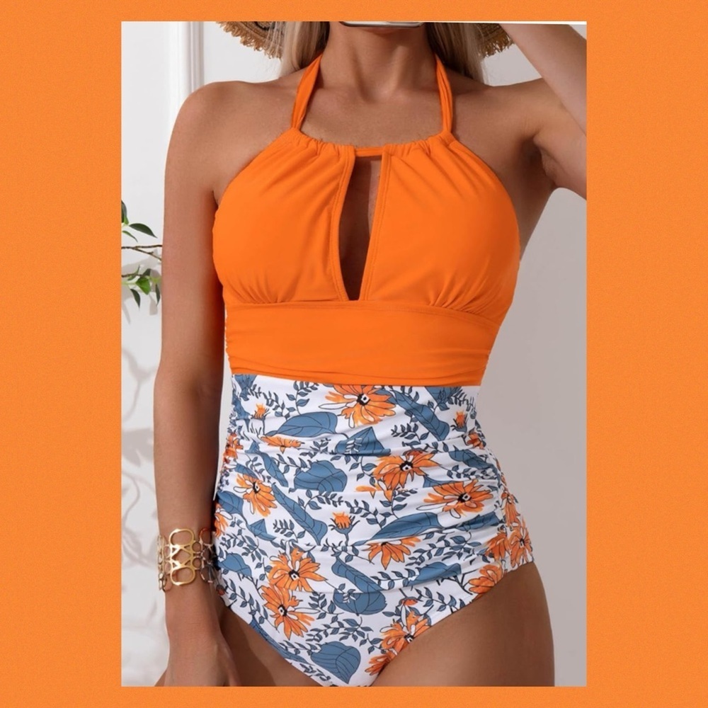 Orange top floral bottom one piece swimsuit.40